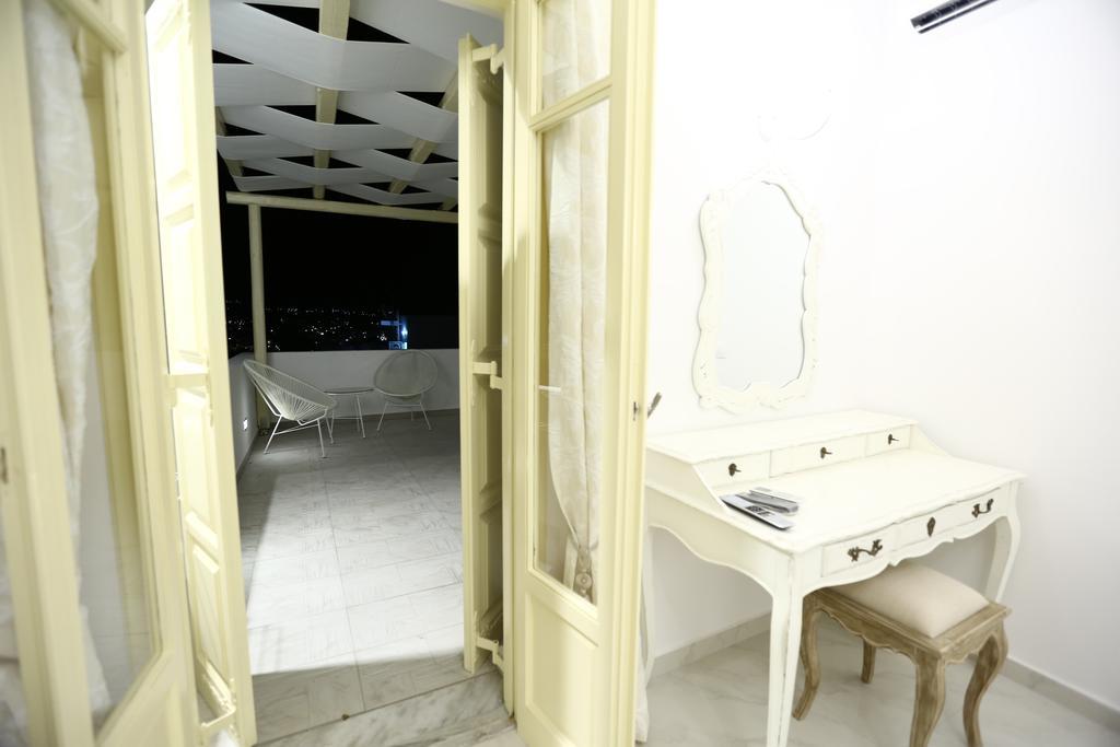 The White Suites 아다마스 객실 사진